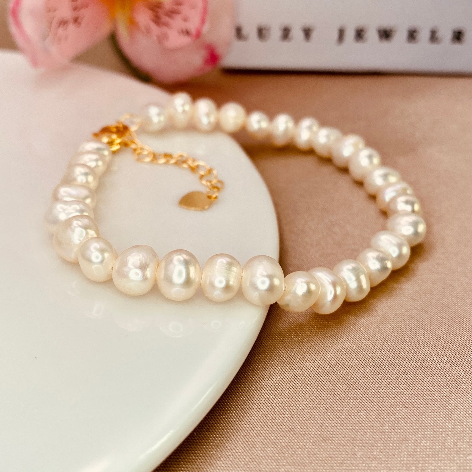Bracelet Of Pearls - Luzy JewelryBraceletsLuzy JewelryBracelet Of Pearls - Luzy JewelryBraceletsLuzy Jewelrycultured_pearls_bracelet_with_14k_gold_plated_lobster_clap_and_extender14kbraceletcultured pearls314kbraceletcultured pearls3